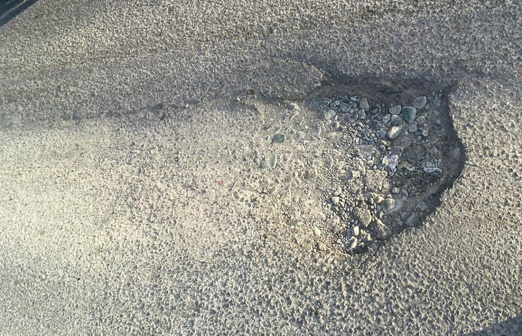 Llamado al Ayuntamiento Municipal para atender problemática de bacheo en SFM